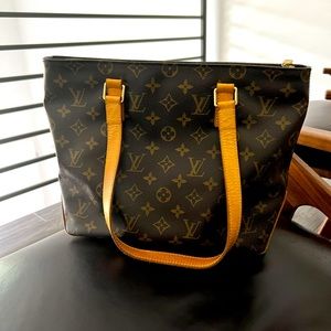 This Louis Vuitton is a good everyday bag. I purchased it in 2009.
